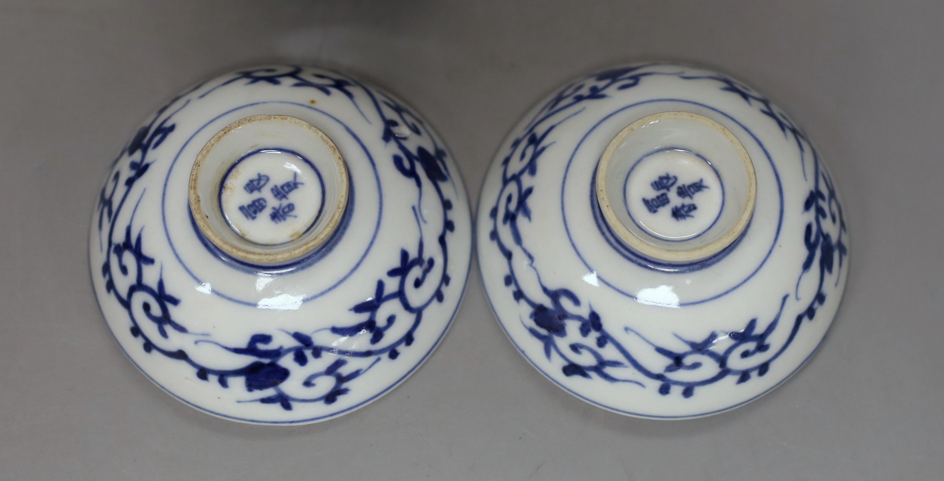 A Japanese blue and white vase, two similar dishes and a tea bowl and saucer